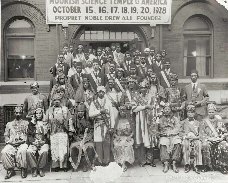 1928 Moorish Science Temple Convention in Chicago. Prophet Noble Drew Ali front row center.